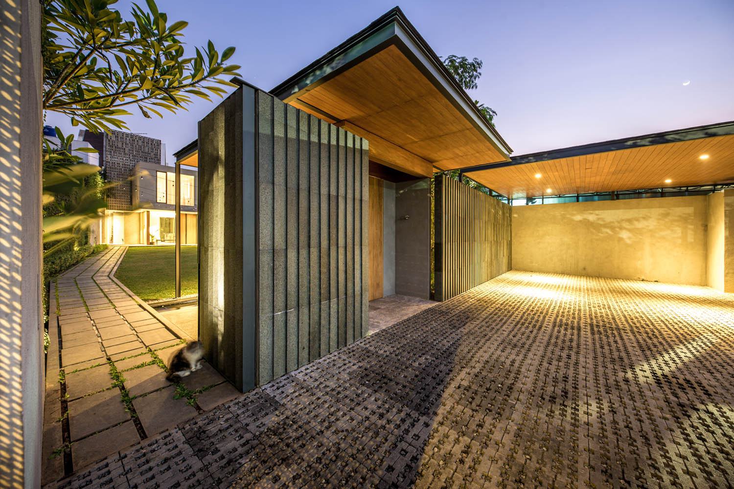 ArMS Creates a Basalt Envelope for a House Renovation in Jakarta