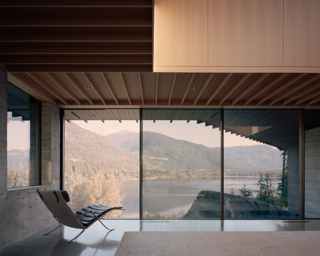 A private residence perched upon a rocky outcrop in Whistler