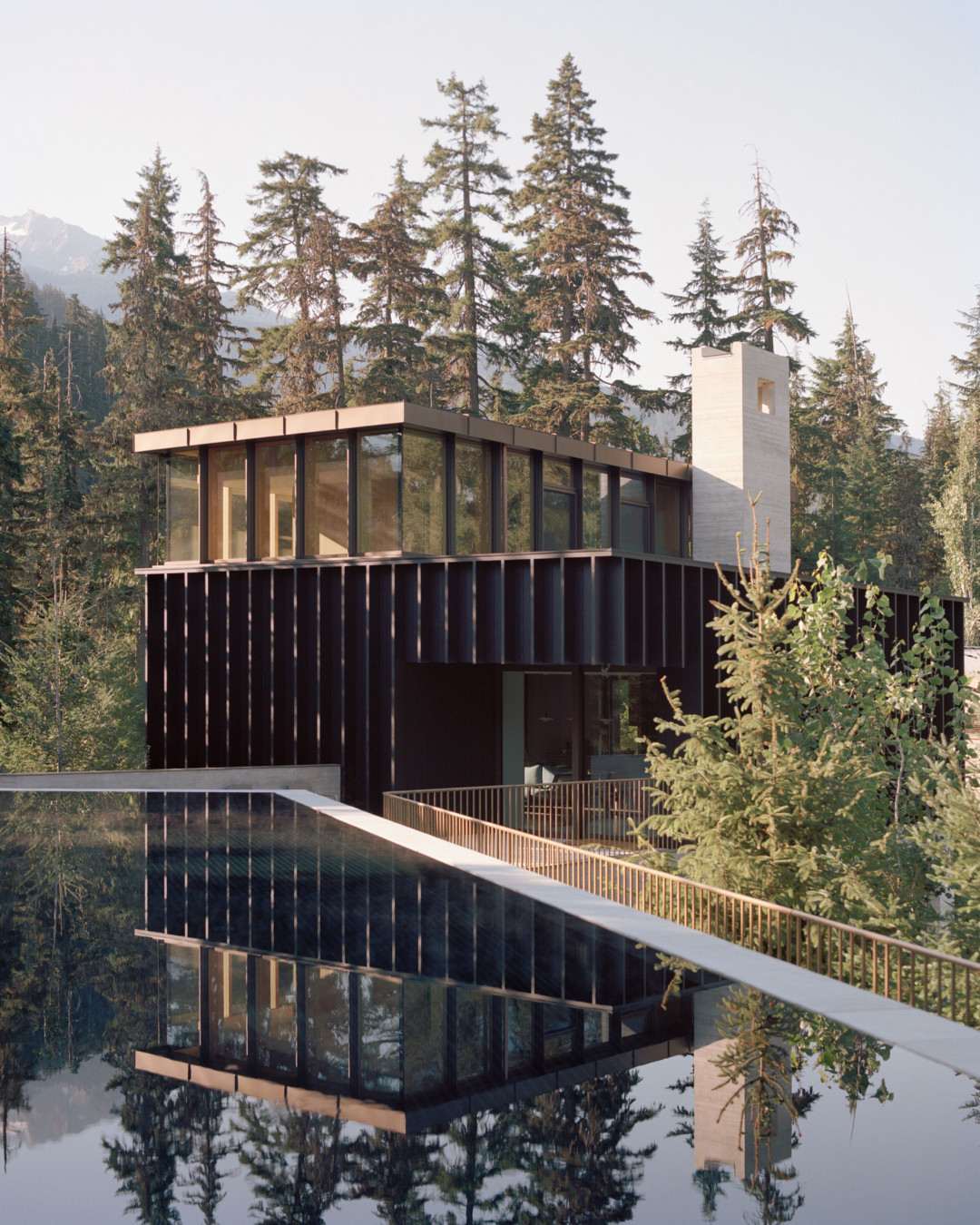A private residence perched upon a rocky outcrop in Whistler