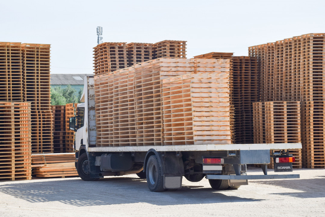 Wooden pallets on back of truck