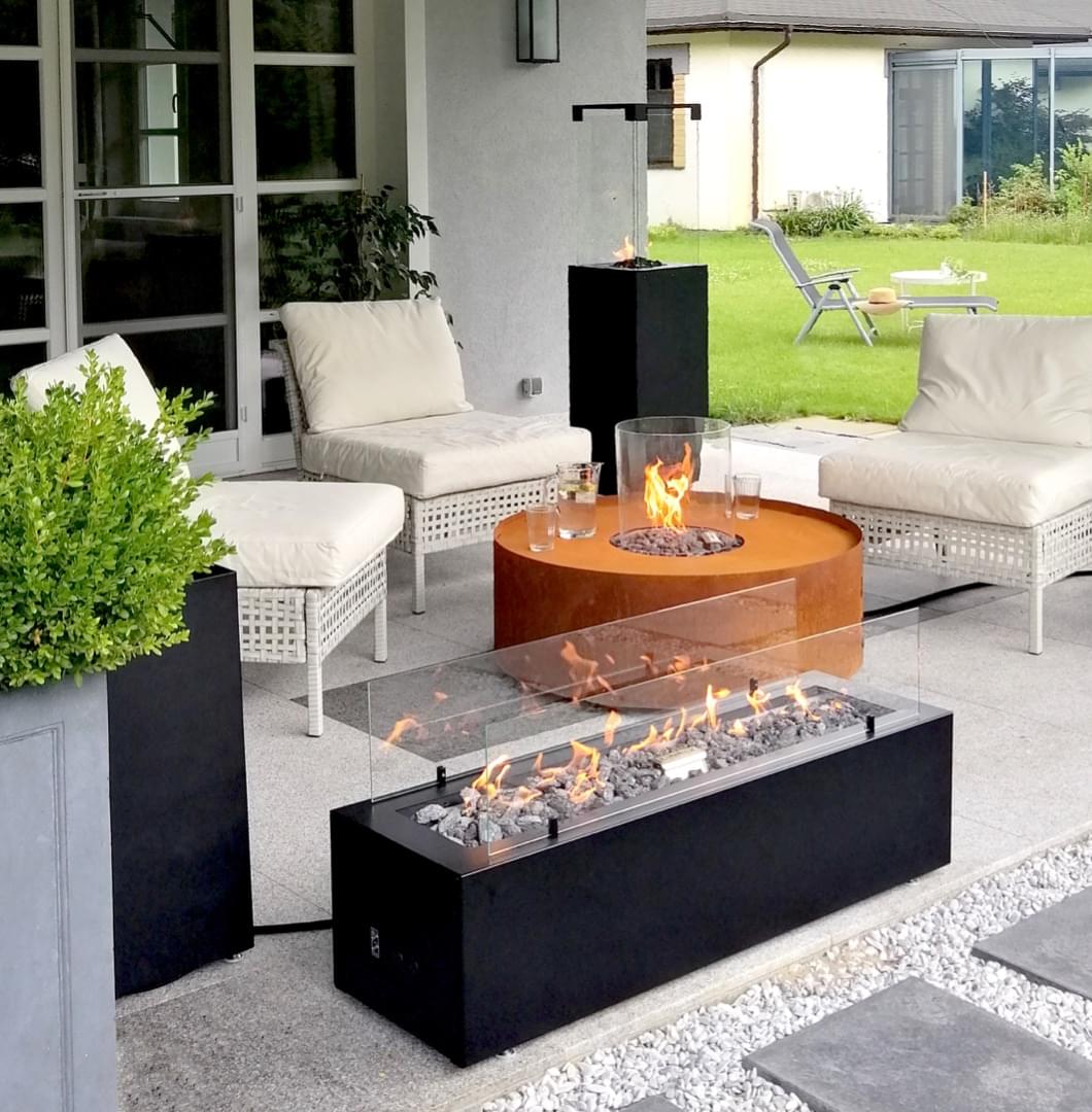 Galio black outdoor fireplace from Planika Net Zero Fireplaces