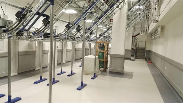 White Conveyors U-Pick-It Automated Uniform Delivery System from Delta Pyramax